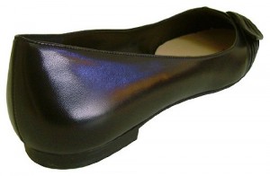 The Ferragamo Lolie Nero Flats is made of calf leather and a cushioned footbed